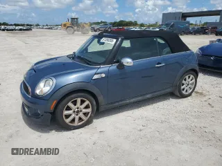 2011 MINI Convertible S with VIN WMWZP3C50BTX83220, listed as a Copart auction lot 61590205 with 80,979 mi miles and Salvage title. Bid and sale history available at DreamBid. Image 1.