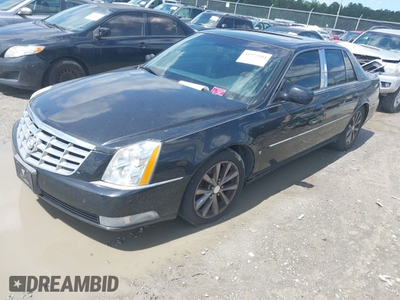 2006 Cadillac DTS 1SE with VIN 1G6KD57976U126634, listed as a IAAI auction lot 41972104 with 148,992 mi miles and . Bid and sale history available at DreamBid. Image 2.