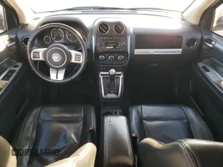 2015 Jeep Compass High Altitude Edition with VIN 1C4NJDEB4FD216777, listed as a Copart auction lot 79407354 with 164,501 mi miles and Salvage Title. Bid and sale history available at carsss.com. Image 8.