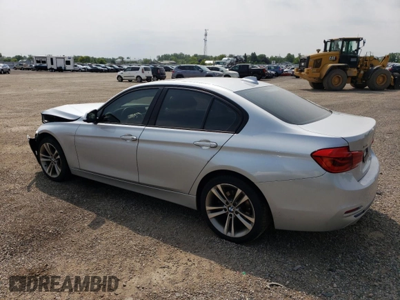 2018 BMW 3 Series 330i xDrive with VIN WBA8D9C54JEM34426, listed as a Copart auction lot 60487205 with 158,224 mi miles and Salvage title. Bid and sale history available at DreamBid. Image 2.