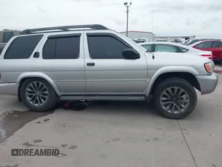 2003 Nissan Pathfinder LE z VIN JN8DR09Y03W800643, wystawiony jako IAAI lot #42373234 z przebiegiem 214 389 mil mil oraz . Historia ofert i sprzedaży dostępna na DreamBid. Obrazek 13.