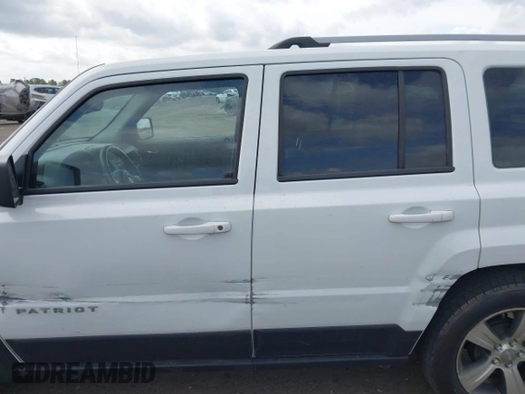 2016 Jeep Patriot High Altitude with VIN 1C4NJPFA0GD732675, listed as a IAAI auction lot 41956028 with 196,740 mi miles and . Bid and sale history available at DreamBid. Image 14.