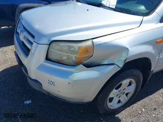 2007 Honda Pilot LX with VIN 5FNYF18167B027915, listed as a IAAI auction lot 41819509 with 206,684 mi miles. Bid and sale history available at carsss.com. Image 6.