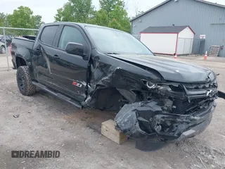 2021 Chevrolet Colorado 4WD Z71 z VIN 1GCGTDENXM1105680, wystawiony jako IAAI lot #42341543 z przebiegiem 85 311 mil mil oraz . Historia ofert i sprzedaży dostępna na DreamBid. Obrazek 1.
