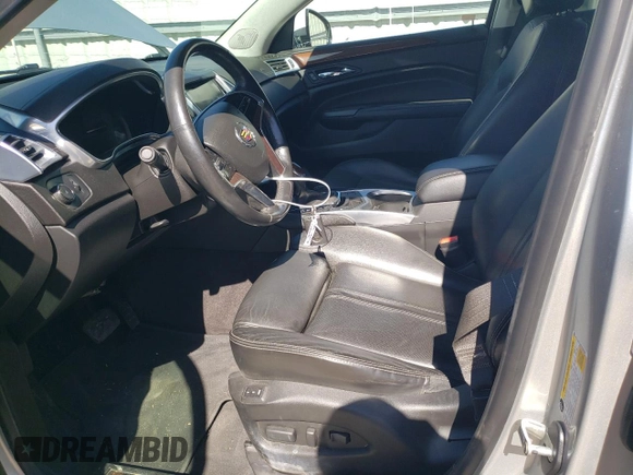 2014 Cadillac SRX Performance Collection z VIN 3GYFNCE38ES559239, wystawiony jako Copart lot #49843955 z przebiegiem 99 497 mil mil oraz Szkoda całkowita • Salvage title. Historia ofert i sprzedaży dostępna na DreamBid. Obrazek 7.
