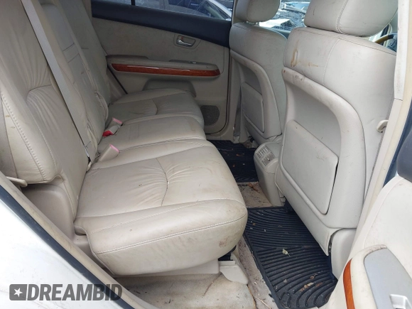 2007 Lexus RX 400h z VIN JTJGW31U372001820, wystawiony jako IAAI lot #41030399 z przebiegiem 91 386 mil mil oraz . Historia ofert i sprzedaży dostępna na DreamBid. Obrazek 8.