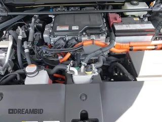 2024 Lexus RZ 450e Premium z VIN JTJAAAABXRA023751, wystawiony jako IAAI lot #42082320 z przebiegiem 15 641 mil mil oraz . Historia ofert i sprzedaży dostępna na DreamBid. Obrazek 10.