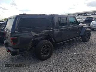 2021 Jeep Gladiator Rubicon with VIN 1C6JJTBG3ML602478, listed as a Copart auction lot 58138705 with 76,759 mi miles and Salvage title. Bid and sale history available at DreamBid. Image 3.