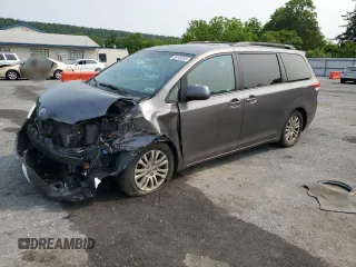 2011 Toyota Sienna XLE AAS with VIN 5TDYK3DC0BS133022, listed as a Copart auction lot 59198045 with 163,886 mi miles and Salvage title. Bid and sale history available at DreamBid. Image 1.