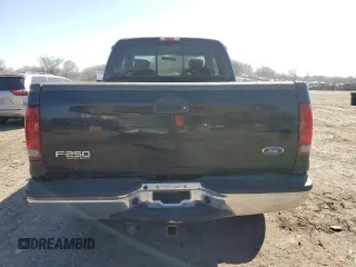 2002 Ford Super Duty F-250 XL with VIN 1FTNX21L32EA33392, listed as a Copart auction lot 48687445 with 184,777 mi miles and Salvage Title. Bid and sale history available at carsss.com. Image 6.