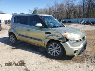 2012 Kia Soul + with VIN KNDJT2A62C7380156, listed as a Copart auction lot 48112215 with 214,993 mi miles and Salvage Title. Bid and sale history available at DreamBid. Image 4.