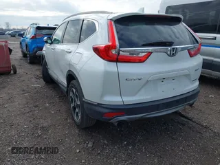 2017 Honda CR-V Touring with VIN 5J6RW2H92HL040217, listed as a IAAI auction lot 41044193 with 180,842 mi miles. Bid and sale history available at carsss.com. Image 3.