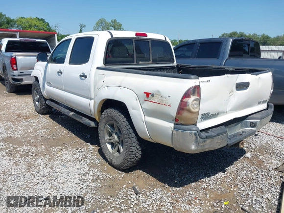 2013 Toyota Tacoma with VIN 5TFLU4EN0DX071533, listed as a IAAI auction lot 42050609 with 204,624 mi miles and . Bid and sale history available at DreamBid. Image 3.