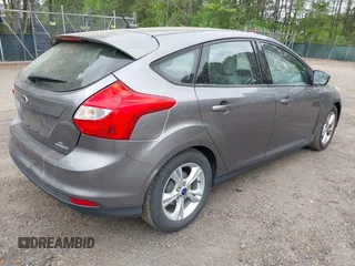 2014 Ford Focus SE with VIN 1FADP3K28EL280100, listed as a IAAI auction lot 42081971 with 183,379 mi miles. Bid and sale history available at carsss.com. Image 4.