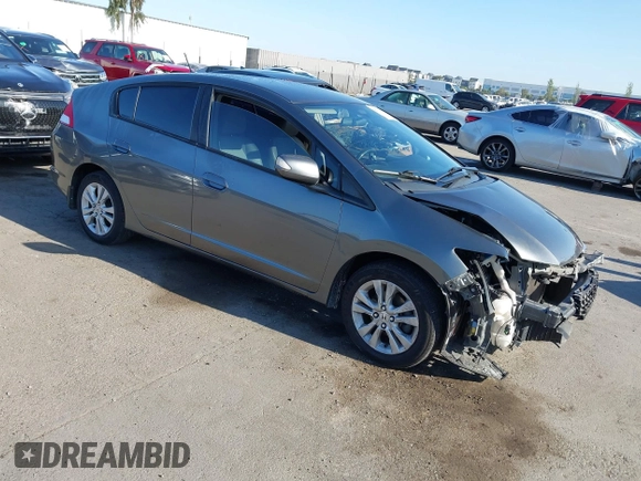 2012 Honda Insight EX z VIN JHMZE2H77CS001370, wystawiony jako IAAI lot #42312077 z przebiegiem 134 249 mil mil oraz . Historia ofert i sprzedaży dostępna na DreamBid. Obrazek 1.