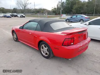 2003 Ford Mustang Deluxe with VIN 1FAFP44433F362647, listed as a IAAI auction lot 41062105 with 168,030 mi miles. Bid and sale history available at carsss.com. Image 3.