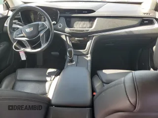 2019 Cadillac XT5 Premium Luxury FWD z VIN 1GYKNERS1KZ284355, wystawiony jako Copart lot #54150405 z przebiegiem 50 001 mil mil oraz Szkody całkowita. Historia ofert i sprzedaży dostępna na DreamBid. Obrazek 8.