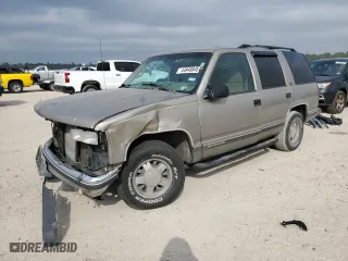 1999 Chevrolet Tahoe with VIN 1GNEC13R9XJ557532, listed as a Copart auction lot 44948845 with 215,360 mi miles and Salvage Title. Bid and sale history available at carsss.com. Image 1.