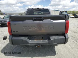 2022 Toyota Tundra SR z VIN 5TFKB5DA7NX047592, wystawiony jako Copart lot #51610295 z przebiegiem 50 737 mil mil oraz Szkoda całkowita • Salvage title. Historia ofert i sprzedaży dostępna na DreamBid. Obrazek 6.