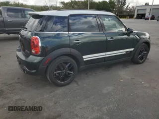 2013 MINI Countryman S ALL4 z VIN WMWZC5C58DWP31357, wystawiony jako Copart lot #51438035 z przebiegiem 98 138 mil mil oraz Szkody całkowita. Historia ofert i sprzedaży dostępna na DreamBid. Obrazek 3.