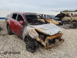 2018 Kia Sportage EX z VIN KNDPNCAC2J7406638, wystawiony jako Copart lot #61051401 z przebiegiem Nie podano mil oraz Szkoda całkowita • Salvage title. Historia ofert i sprzedaży dostępna na DreamBid. Obrazek 1.
