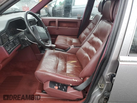 1990 Volvo 760 with VIN YV1GA8740L0089828, listed as a Copart auction lot 84668844 with 272,600 mi miles and Salvage title. Bid and sale history available at DreamBid. Image 7.