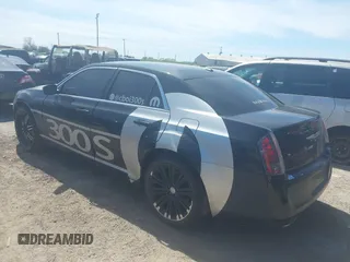2013 Chrysler 300 with VIN 2C3CCABG1DH709935, listed as a IAAI auction lot 41814279 with 101,174 mi miles. Bid and sale history available at carsss.com. Image 3.