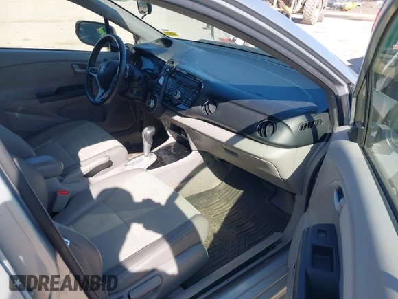 2013 Honda Insight EX z VIN JHMZE2H70DS005200, wystawiony jako IAAI lot #42105624 z przebiegiem 108 949 mil mil oraz . Historia ofert i sprzedaży dostępna na DreamBid. Obrazek 5.