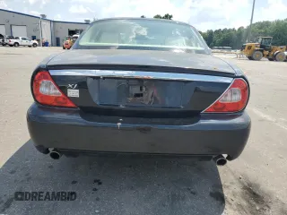 2008 Jaguar XJ with VIN SAJWA79B28SH26841, listed as a Copart auction lot 59914574 with 0 mi miles and Salvage Title. Bid and sale history available at carsss.com. Image 6.