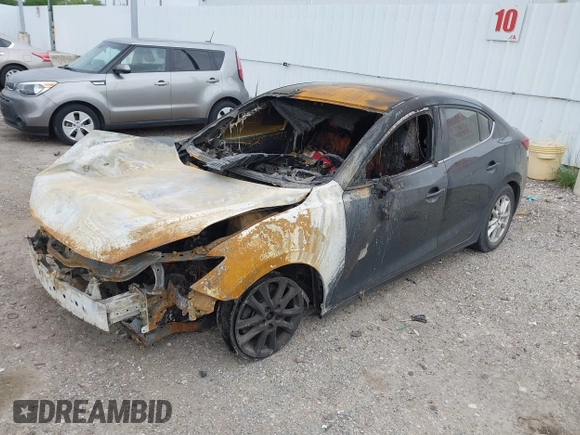 2014 Mazda 3 i Touring z VIN JM1BM1V71E1215932, wystawiony jako IAAI lot #42138164 z przebiegiem Nie podano mil oraz . Historia ofert i sprzedaży dostępna na DreamBid. Obrazek 2.