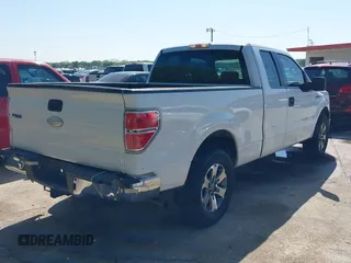 2009 Ford F-150 STX with VIN 1FTRX12W89KC52056, listed as a IAAI auction lot 41982659 with 318,539 mi miles. Bid and sale history available at carsss.com. Image 4.