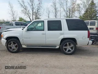 2000 Cadillac Escalade z VIN 1GYEK63R1YR207043, wystawiony jako IAAI lot #42139944 z przebiegiem 225 265 mil mil oraz . Historia ofert i sprzedaży dostępna na DreamBid. Obrazek 14.