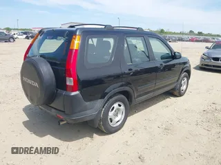 2004 Honda CR-V LX with VIN SHSRD68474U209015, listed as a IAAI auction lot 42040424 with 100,923 mi miles and . Bid and sale history available at carsss.com. Image 4.