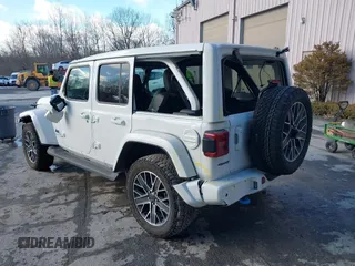 2024 Jeep Wrangler High Altitude z VIN 1C4RJXU60RW176763, wystawiony jako IAAI lot #41508931 z przebiegiem 11 026 mil mil oraz . Historia ofert i sprzedaży dostępna na DreamBid. Obrazek 3.