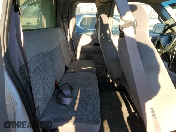 2000 Ford F-150 with VIN 1FTRX17W8YKB11043, listed as a Copart auction lot 77390664 with 181,439 mi miles and Salvage Title. Bid and sale history available at DreamBid. Image 10.