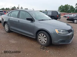 2014 Volkswagen Jetta S z VIN 3VW2K7AJ2EM313510, wystawiony jako IAAI lot #42334212 z przebiegiem 180 245 mil mil oraz . Historia ofert i sprzedaży dostępna na DreamBid. Obrazek 1.