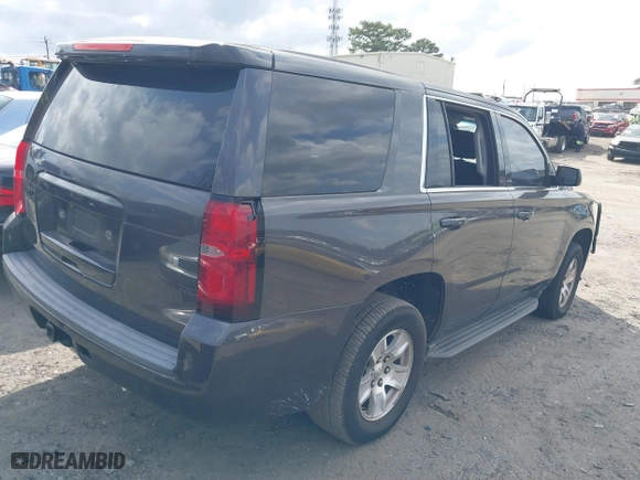 2017 Chevrolet Tahoe Commercial with VIN 1GNLCDEC2HR256539, listed as a IAAI auction lot 41718466 with 202,134 mi miles. Bid and sale history available at carsss.com. Image 4.