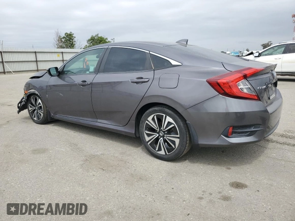 2017 Honda Civic Sedan EX-T with VIN 2HGFC1F37HH635251, listed as a Copart auction lot 52989145 with 127,679 mi miles and Clean Title. Bid and sale history available at carsss.com. Image 2.