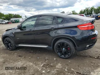 2012 BMW X6 50i z VIN 5UXFG8C51CLZ97393, wystawiony jako Copart lot #58407285 z przebiegiem 128 040 mil mil oraz Szkoda całkowita • Salvage title. Historia ofert i sprzedaży dostępna na DreamBid. Obrazek 2.