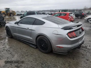 2021 Ford Mustang EcoBoost with VIN 1FA6P8TH3M5138829, listed as a Copart auction lot 87252464 with 59,644 mi miles and Salvage Title. Bid and sale history available at carsss.com. Image 2.