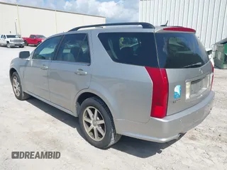 2004 Cadillac SRX with VIN 1GYEE63A840185428, listed as a IAAI auction lot 42088949 with 207,821 mi miles. Bid and sale history available at carsss.com. Image 3.