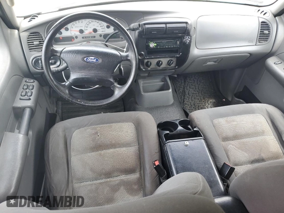 2005 Ford Explorer Sport Trac XLS with VIN 1FMZU67K85UA59170, listed as a Copart auction lot 54472775 with 227,225 mi miles and Salvage title. Bid and sale history available at DreamBid. Image 8.