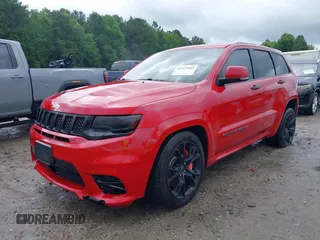 2017 Jeep Grand Cherokee SRT z VIN 1C4RJFDJXHC670370, wystawiony jako IAAI lot #41524965 z przebiegiem 87 276 mil mil oraz . Historia ofert i sprzedaży dostępna na DreamBid. Obrazek 18.