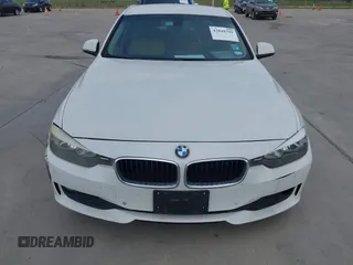 2015 BMW 3 Series 320i с VIN WBA3B1G5XFNT05271, выставлен на аукционе IAAI как лот 42049799 с пробегом 125 437 миль миль и . История ставок и продаж доступна на DreamBid. Изображение 12.