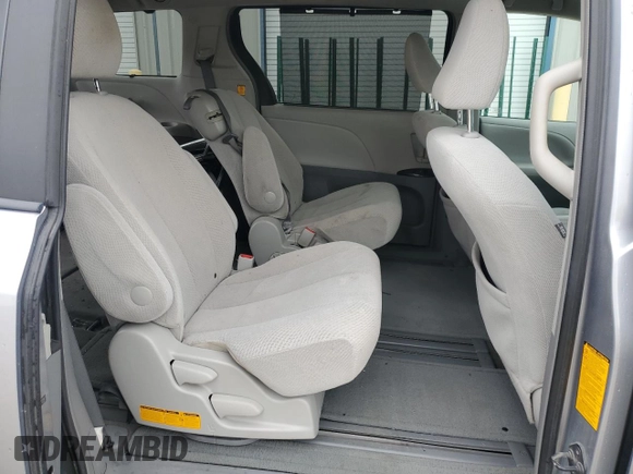 2012 Toyota Sienna LE AAS z VIN 5TDKK3DC0CS222967, wystawiony jako Copart lot #58044405 z przebiegiem 219 970 mil mil oraz Szkoda całkowita • Salvage title. Historia ofert i sprzedaży dostępna na DreamBid. Obrazek 11.