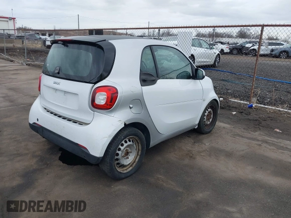 2016 Smart fortwo Passion with VIN WMEFJ5DA9GK046904, listed as a IAAI auction lot 41730029 with 143,301 mi miles and . Bid and sale history available at DreamBid. Image 4.