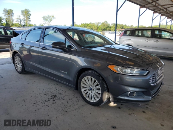 2015 Ford Fusion SE Hybrid with VIN 3FA6P0LU5FR218454, listed as a Copart auction lot 60682065 with 218,668 mi miles and Salvage title. Bid and sale history available at DreamBid. Image 4.