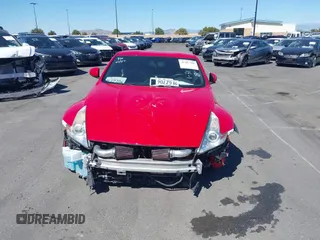 2014 Nissan 370Z Nismo with VIN JN1AZ4EH9EM636306, listed as a IAAI auction lot 41467766 with 101,021 mi miles and . Bid and sale history available at DreamBid. Image 13.