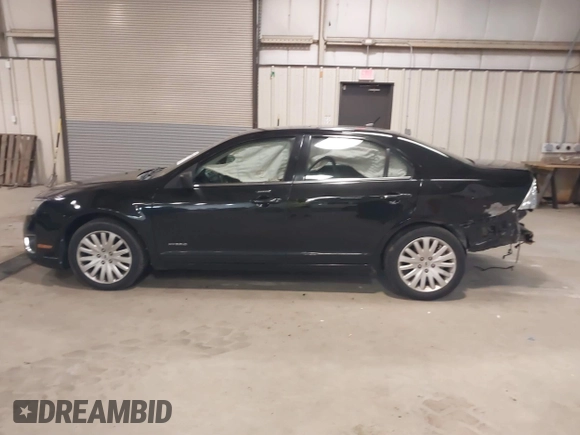 2010 Ford Fusion Hybrid with VIN 3FADP0L39AR140087, listed as a IAAI auction lot 41737705 with 118,563 mi miles. Bid and sale history available at carsss.com. Image 14.