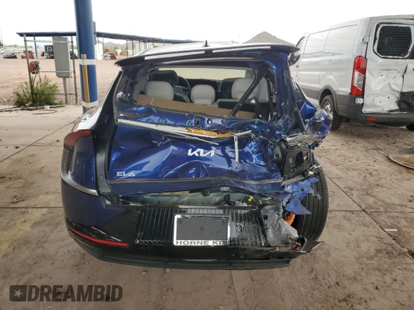 2023 Kia EV6 Wind with VIN KNDC34LA2P5606994, listed as a Copart auction lot 69288354 with 8,477 mi miles and Salvage Title. Bid and sale history available at carsss.com. Image 6.